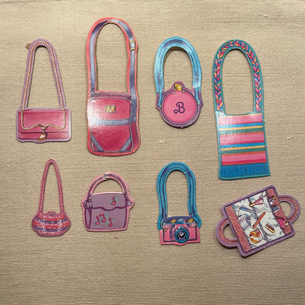 Assorted vintage Barbie paper purse accessories